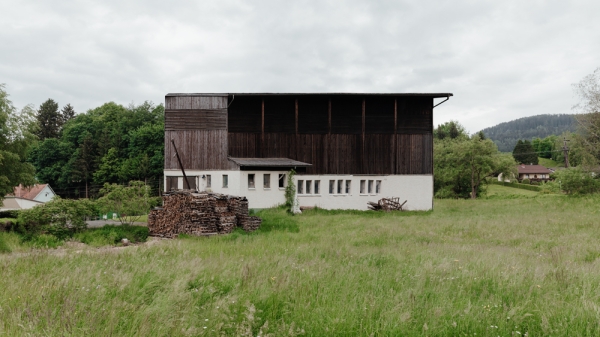 Farm barn in green countryside