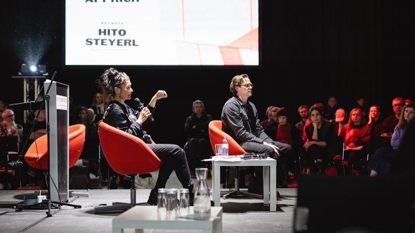 Hito Steyerl and Clemens Apprich on the podium
