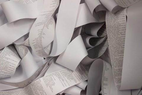 Close-up view of Dominic Staszak AI-generated poetry on a paper roll